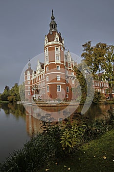 Moat and New Castle in the park Muskauer