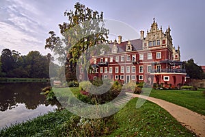 Moat and New Castle in the park Muskauer