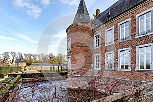 Moat and part of 16th century Alden Biesen castle