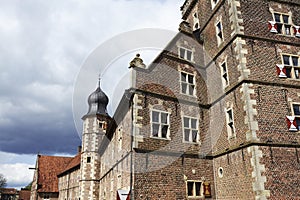 Moated castle Raesfeld Germany - Sun and clouds