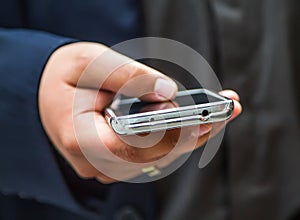 Mobil phone in the hand