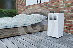 Mobile air conditioner in bedroom with brick wall	3d