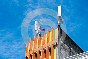 A mobile antenna mounted on a rooftop, providing wireless communication coverage