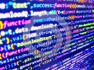 Mobile app building. Screen close up. Script on computer with source code. Programming code. Binary digits code editing. Abstract