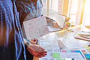 mobile application development team is studying and designing ux ui system to display and color in application on smartphone to