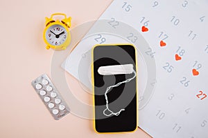 Mobile application to track your menstrual cycle and for marks. PMS and the critical days concept. Cotton tampon and