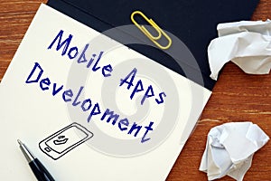 Mobile apps development phrase on the sheet