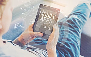 Mobile apps with man using a tablet