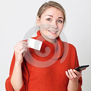 Mobile commerce for smiling girl making online transaction