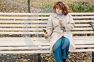 mobile communication autumn day woman phone bench
