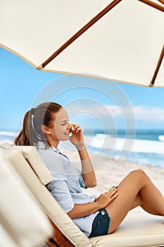 Mobile Communication. Woman Calling On Phone. Summer Beach. Freelance