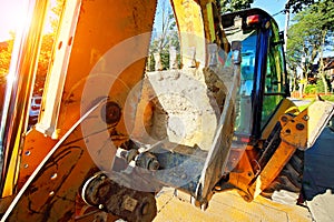 Mobile crane at work at downtown construction site