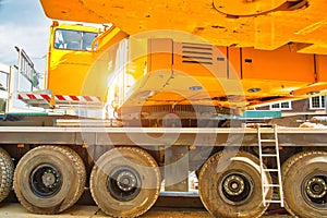 Mobile crane at work at downtown construction site
