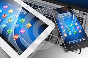 Mobile devices. Tablet PC, smartphone on laptop, technology conc