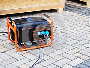 Mobile Gasoline Generator on the Building Site