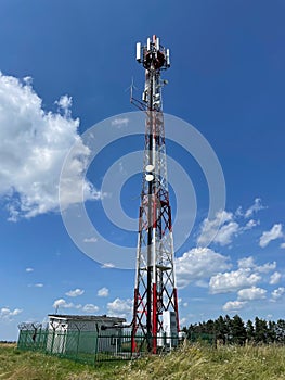 Mobile network transmitter tower on the hill