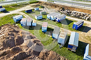 Mobile office buildings or container site office for construction site. Residential town of builders. Temporary facility to house