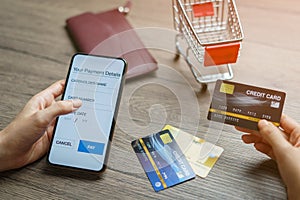 Mobile payments. hands using smartphone and credit card for online shopping