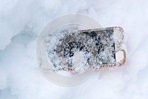 Mobile phone accidentally fell out and got lost in the snow