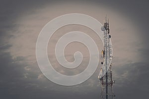 Mobile phone communication antenna tower with the blue sky and c