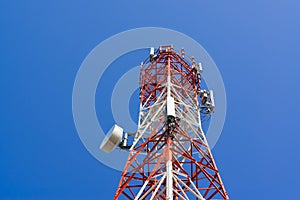 Mobile phone communication antenna tower with satellite dish on