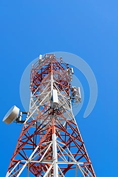 Mobile phone communication antenna tower with satellite dish on