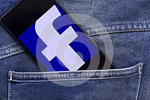 Mobile phone displaying facebook application