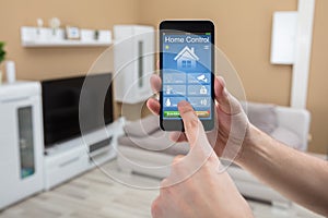 Mobile Phone With Home Control System On Screen