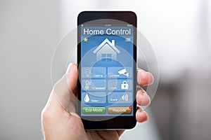 Mobile Phone With Home Control System On A Screen