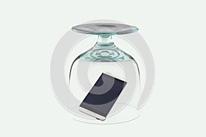 Mobile phone isolated under the glass bell
