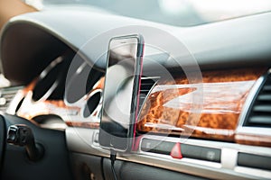Mobile phone on magnet car mount phone holder for GPS