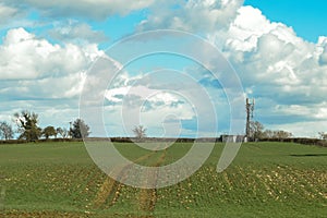 Mobile phone mast to transmit to networks in a rural field