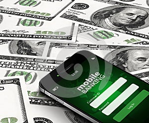 Mobile phone with mobile banking screen over dollars