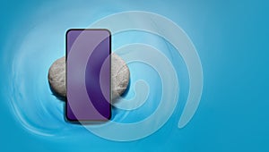 Mobile Phone Mockup. included a Clipping Path. for Self Care or Meditation App Design Screen . Smartphone on Pebble Stone