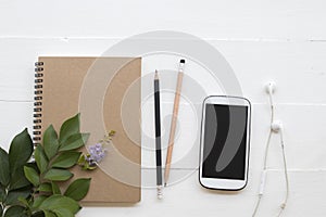 Mobile phone ,notebook of student writing note for study