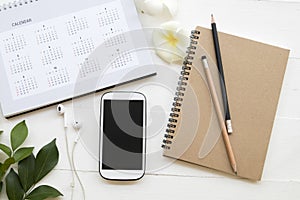 Mobile phone ,notebook of student writing note for study