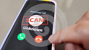 A mobile phone showing incoming call from unknown caller