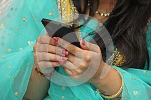 Mobile phone in Teenager girl's hand