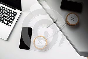 Mobile phone and wireless charger on office table