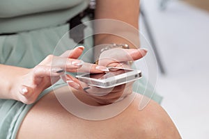 Mobile phone in a woman's hands