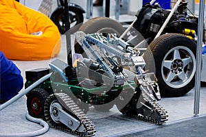 Mobile self-propelled robot. Mobile crawler robot with arm manipulator