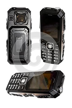 Mobile shockproof phone on a white background.Shockproof push-button mobile phone with a powerful battery.