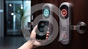 mobile smart phone use for open safety door and opens the door of his home. photo