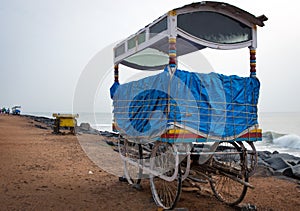 Mobile stalls along sandy beach in Pondicherry, photo