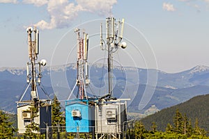 Mobile telecommunication tower or cell tower with antenna and electronic communications equipment in carpathian mountains