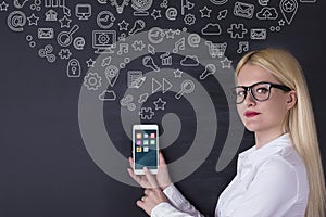 Mobile text message concept on the blackboard