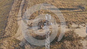 Mobile tower in the countryside - aerial drone orbit shot