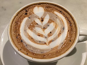 Mocaccino. Mocha. Chocolate coffee. latte flower art. Classic . close up .