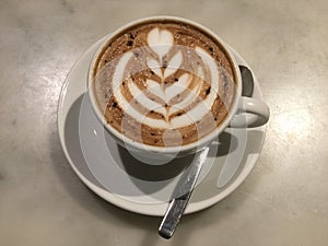 Mocaccino. Mocha. Top view. latte flower art. Classic latte.