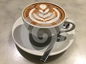 Mocaccono. Mocha. Chocolate cafe. latte art. Close up. photo